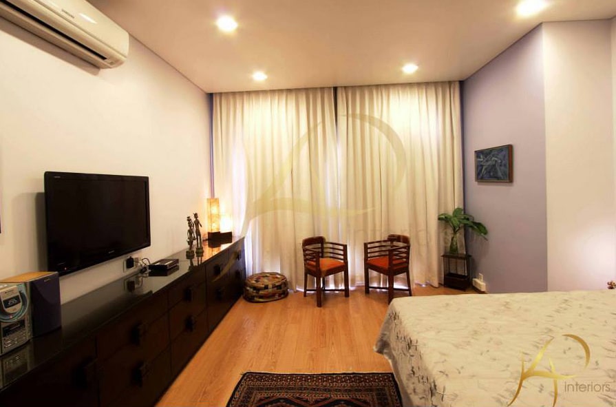Modern Bedroom With Small Orange Chairs by KP Interior Bedroom Contemporary | Interior Design Photos & Ideas