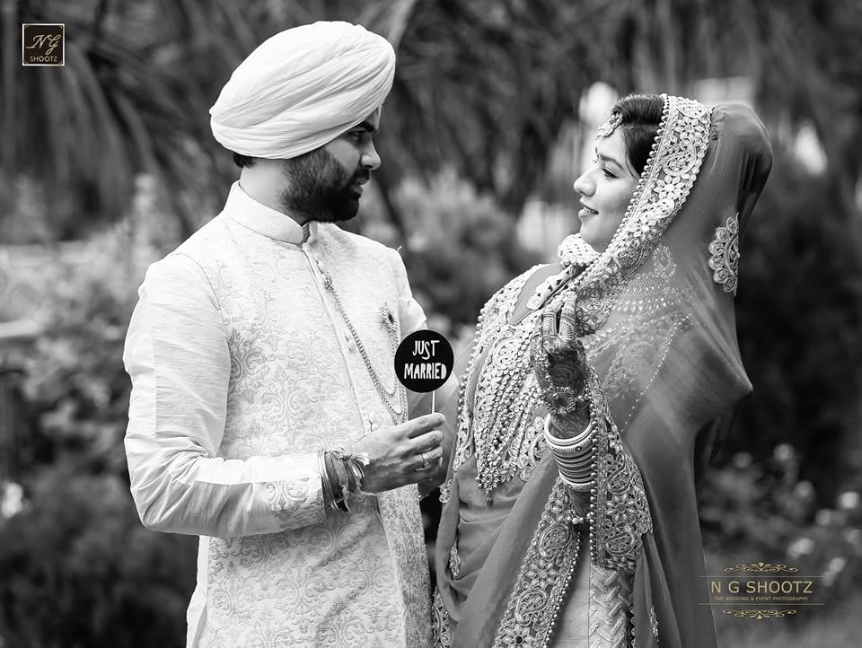 A lovely black and white photograph of the couple right after getting hitched by NG Shootz Wedding-photography | Weddings Photos & Ideas