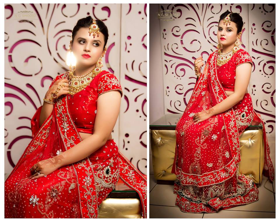 The bride posing in her beautiful red lehenga by NG Shootz Wedding-photography | Weddings Photos & Ideas