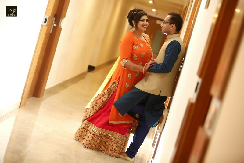 The couple having a romantic moment together by NG Shootz Wedding-photography | Weddings Photos & Ideas