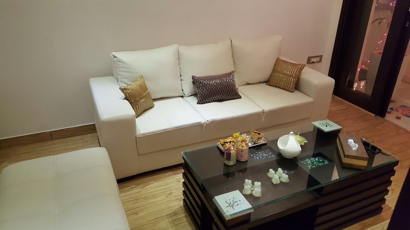 White Leather Lawsons Sofa and Glass Center Table by Sakshi Gugnani Living-room Modern | Interior Design Photos & Ideas