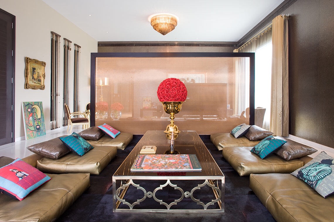 Comfortable Living Room With Golden Floor Mattresses and Bronze Flower Vase by Sakshi Gugnani Living-room Eclectic | Interior Design Photos & Ideas