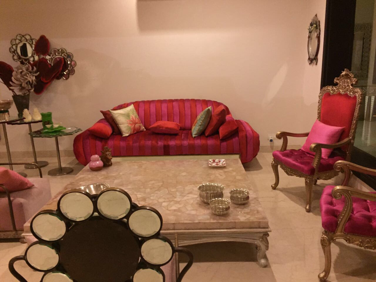 Regal Living Room Decor With Red Cabriole Sofa by Sakshi Gugnani Living-room Modern | Interior Design Photos & Ideas