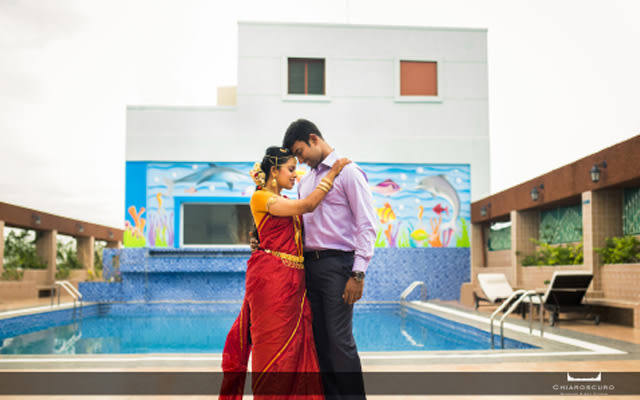 Poolside shot of the stellar couple by Chiaroscuro Wedding and Art Studio Wedding-photography | Weddings Photos & Ideas
