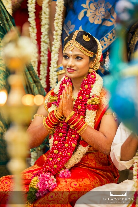 The bride with an elegant namaste by Chiaroscuro Wedding and Art Studio Wedding-photography | Weddings Photos & Ideas