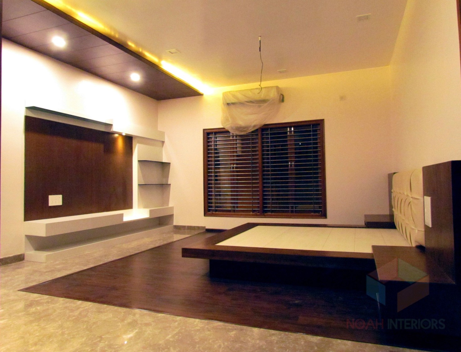 Master bedroom with wooden flooring by Noah Interiors Bedroom Modern | Interior Design Photos & Ideas