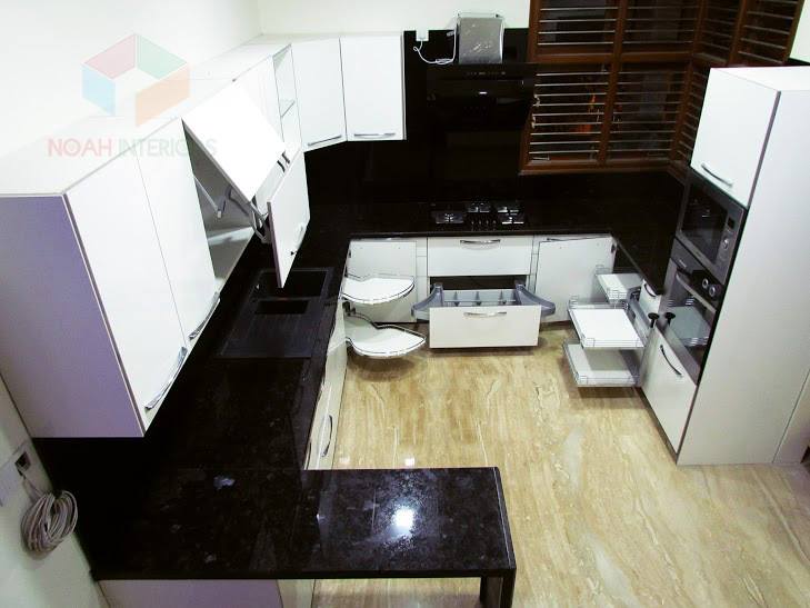 Modular L shaped kitchen with wooden flooring by Noah Interiors Modular-kitchen Modern | Interior Design Photos & Ideas