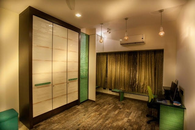 Modern bedroom with wooden flooring by Five Elements Bedroom Modern | Interior Design Photos & Ideas