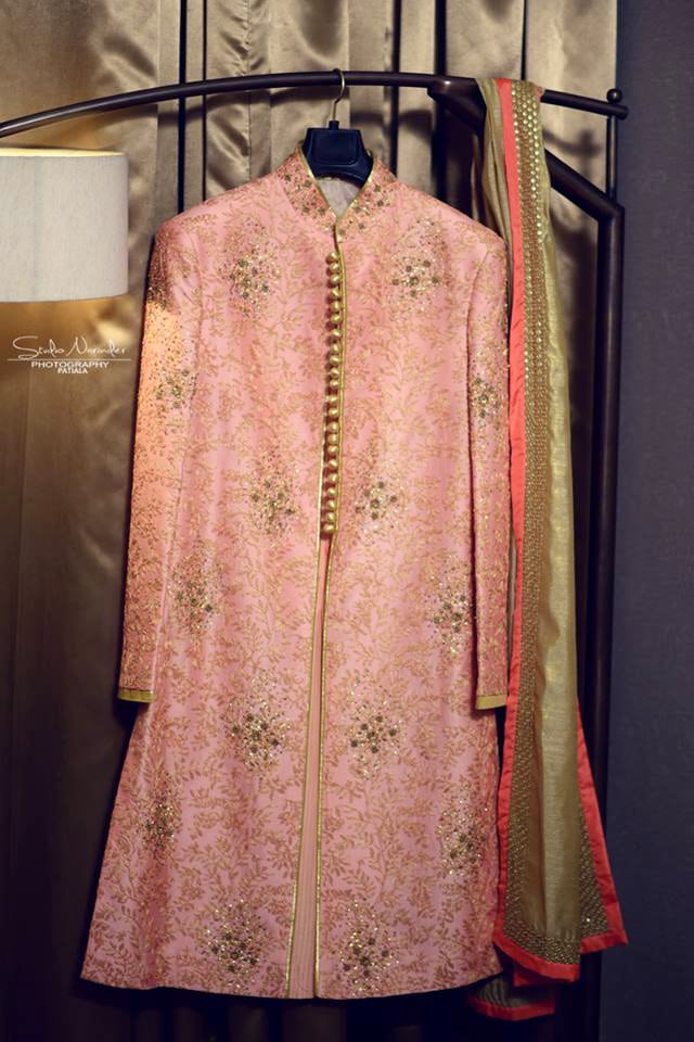 Pastel Pink Sherwani With Inticated Golden Work And Golden Buttons by Sourab Sharma Wedding-photography | Weddings Photos & Ideas