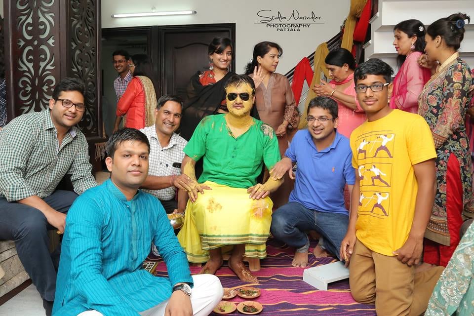Groom Striking A pose With Family During Haldi Ceremony by Sourab Sharma Wedding-photography | Weddings Photos & Ideas