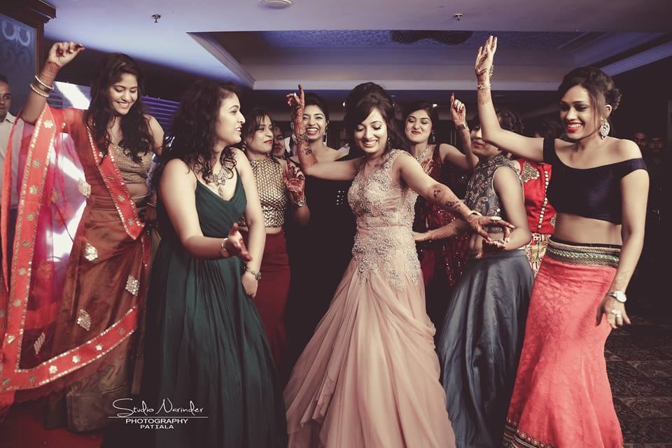 Candid Shot Of Bride With Bridesmaids Amidst Dancing by Sourab Sharma Wedding-photography | Weddings Photos & Ideas