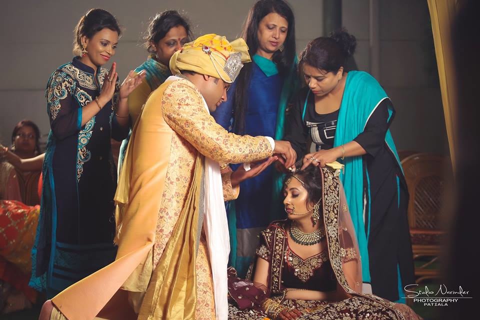 Candid Shot Of Bridegroom Amidst The Most Auspicious Maang Bharai Ceremony by Sourab Sharma Wedding-photography | Weddings Photos & Ideas