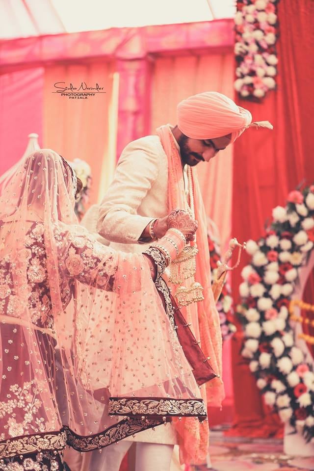 Candid Shot Of Bridegroom Amidst Auspicious Nuptial Round Ceremony by Sourab Sharma Wedding-photography | Weddings Photos & Ideas