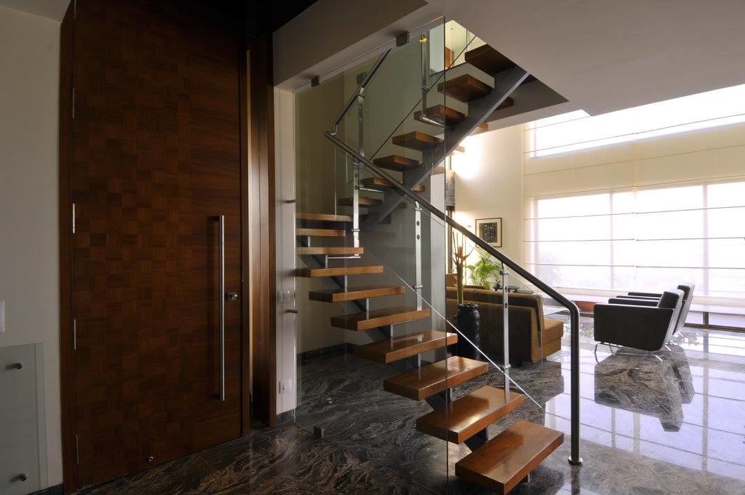 Modern staircase with marble flooring by Midas Dezign - The Golden Touch Indoor-spaces Modern | Interior Design Photos & Ideas