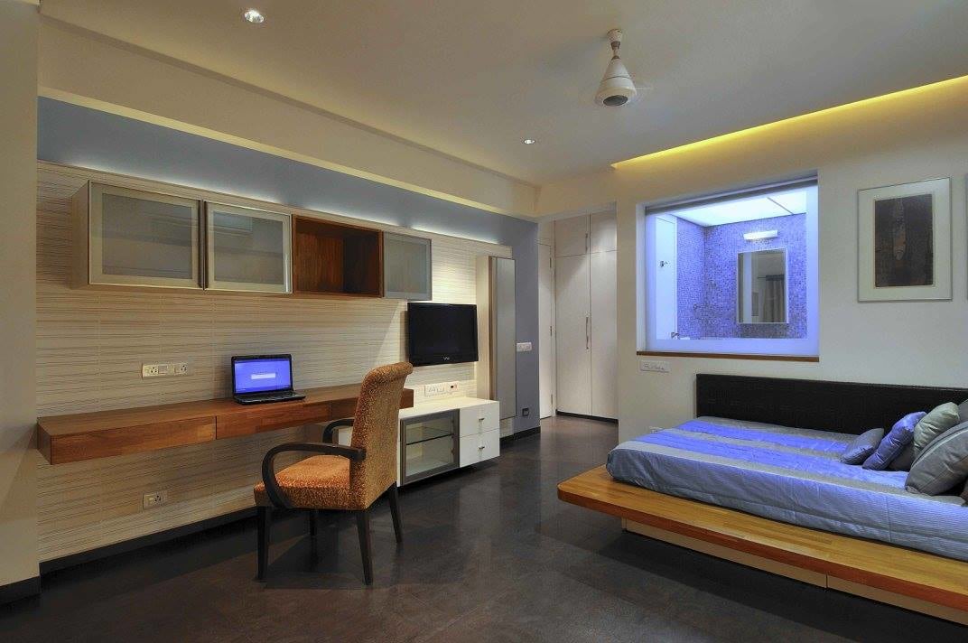 Modern bedroom with tv and marble flooring by Midas Dezign - The Golden Touch Bedroom Modern | Interior Design Photos & Ideas