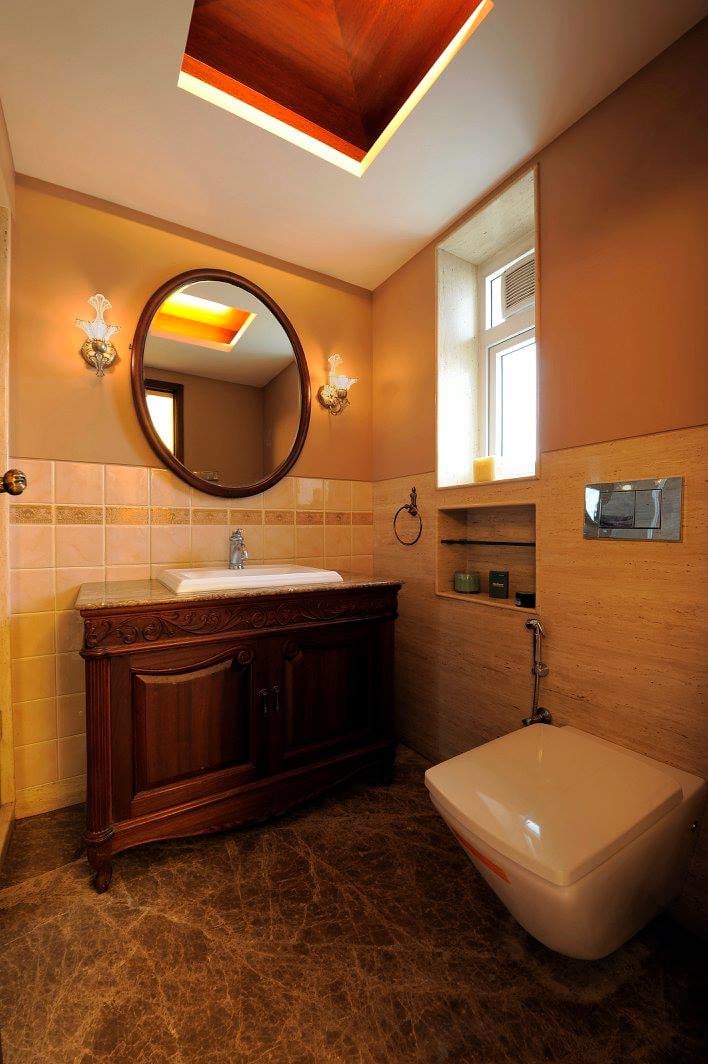 Peach Shaded Bathroom With Round Mirror by Midas Dezign Bathroom Modern | Interior Design Photos & Ideas