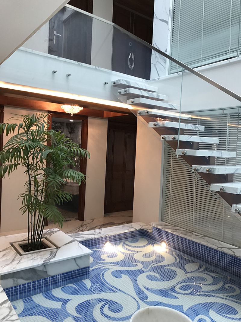 Modern staircase with marble flooring by SA Design Group Modern | Interior Design Photos & Ideas