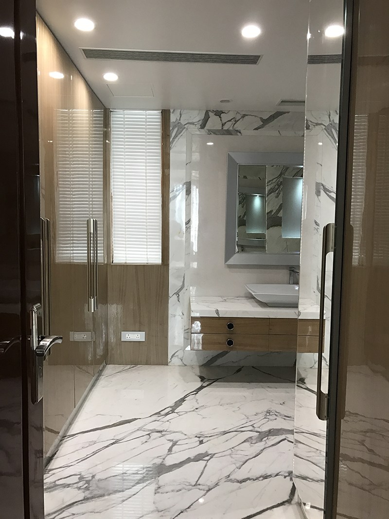 Design of a modern bathroom with marble flooring by SA Design Group Bathroom Modern | Interior Design Photos & Ideas