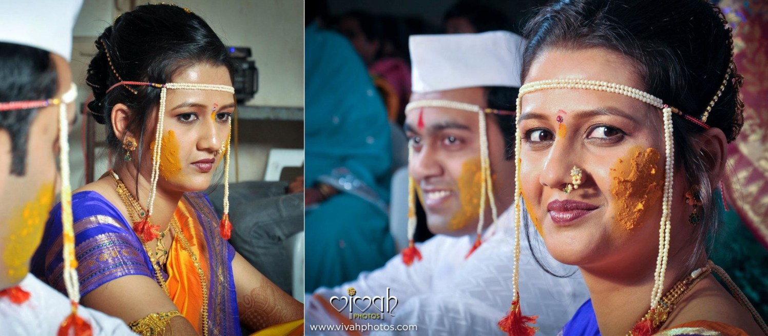 Haldi on her cheeks by VIVAH PHOTOS Wedding-photography | Weddings Photos & Ideas