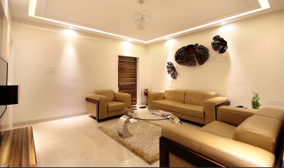 Living Room With Cream Lawson Sofas and glass top center table by Amit Sharma Living-room Minimalistic | Interior Design Photos & Ideas
