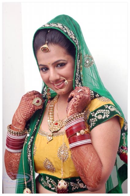 Quaint Bride Pose by The Action Photography Wedding-photography | Weddings Photos & Ideas
