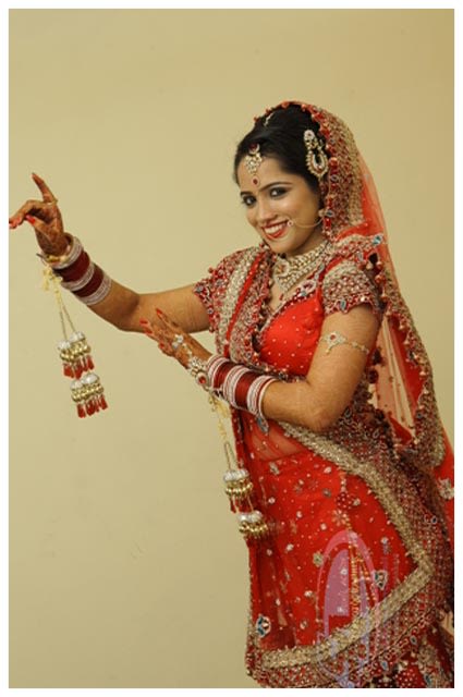 Fun Bride Pose by The Action Photography Wedding-photography | Weddings Photos & Ideas