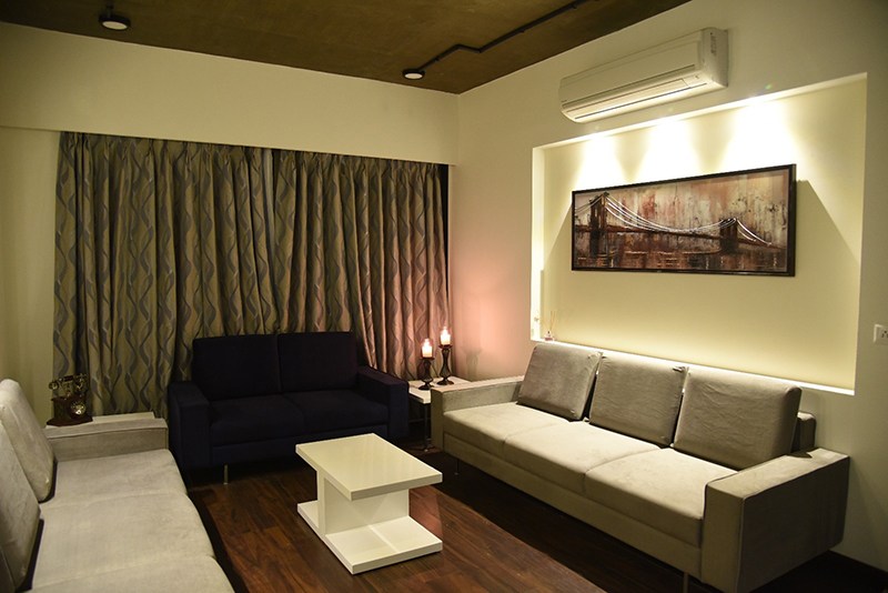 Grey Lawson Style Sofa With Centre Table And Wooden Fooring by Ankil Desai Living-room Modern | Interior Design Photos & Ideas
