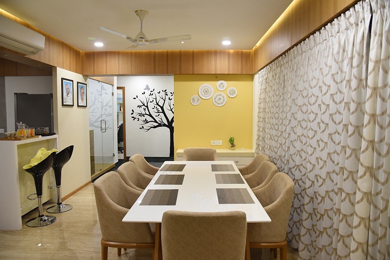 white Colored Dining Table With Beige Colored Dining Chairs by Ankil Desai Dining-room Modern | Interior Design Photos & Ideas