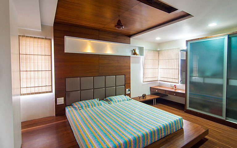 Glass Door Wooden Wardrobe And Wooden Flooring In Bedroom by Parthsarthi Bedroom Modern | Interior Design Photos & Ideas