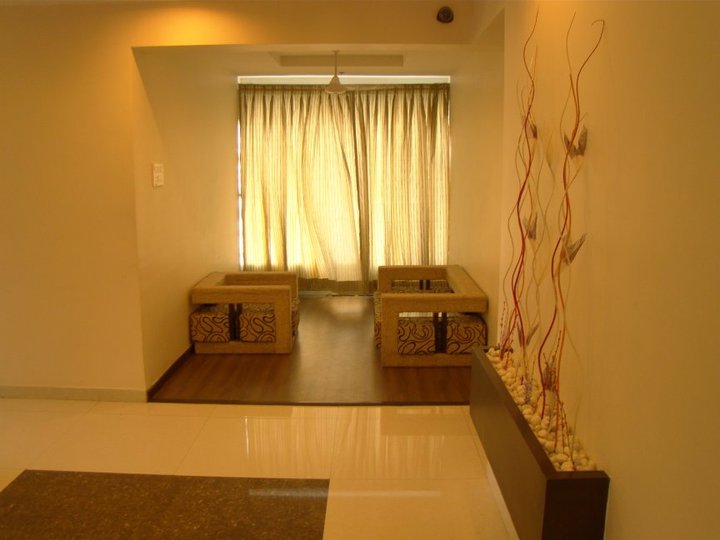 Small Living Room with a beige theme and wooden flooring by Parthsarthi Living-room Contemporary | Interior Design Photos & Ideas