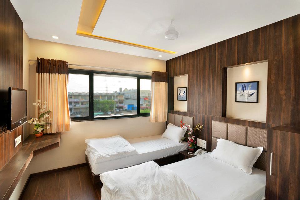 Bedroom With White Ceiling And Wooden Furnishing by Parthsarthi Bedroom Contemporary | Interior Design Photos & Ideas