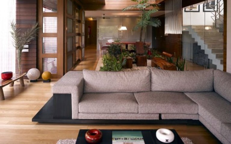 Premium Wooden Living Room with Plants by Eureka Interiors Living-room Contemporary | Interior Design Photos & Ideas