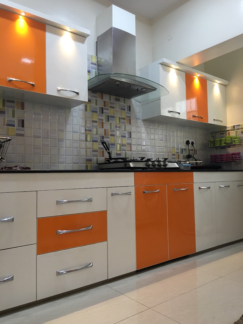 Orange Modular Kitchen by Deepak