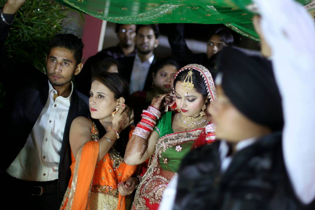 The bride walking with her relatives by Proffesional Photographer Wedding-photography | Weddings Photos & Ideas