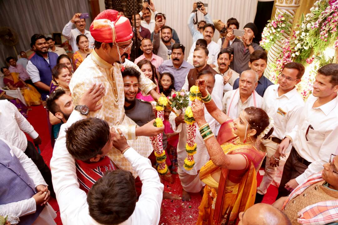 The family enjoying the wedding rituals by Proffesional Photographer Wedding-photography | Weddings Photos & Ideas