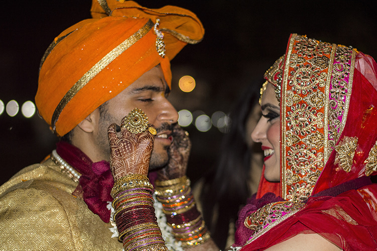 The wedding couple enjoying a candid moment by Exprezzions Wedding-photography | Weddings Photos & Ideas