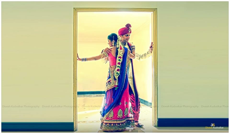 A stunning pose by the wedding couple by Arya Arts Wedding-photography | Weddings Photos & Ideas
