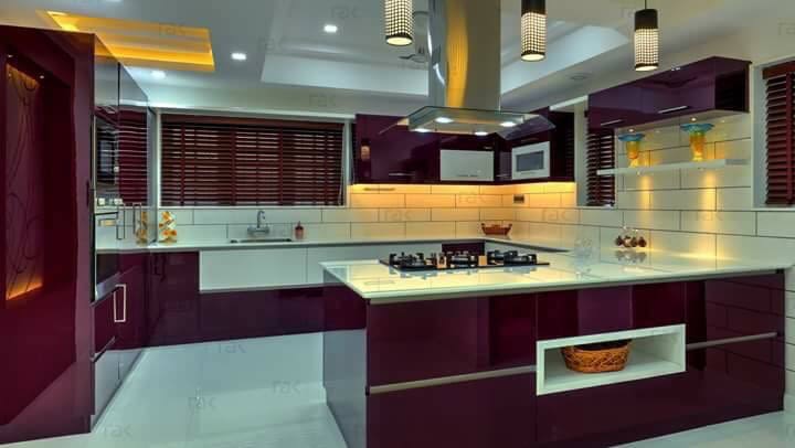 A cherry coloured modular kitchen! by Pamin Patel Modular-kitchen | Interior Design Photos & Ideas