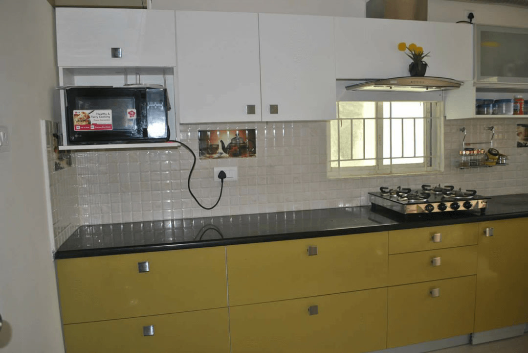 Yellow Modular Kitchen by Urban Geometry