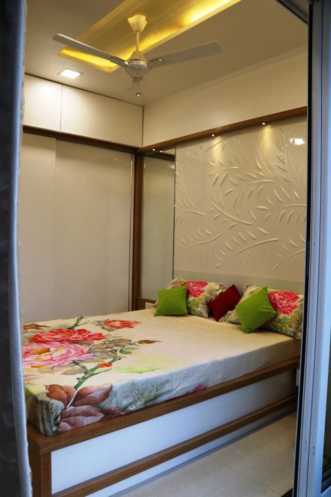 Low Rise Wooden Bed With Patterned Wall by Rajat Ajmera Bedroom Contemporary | Interior Design Photos & Ideas
