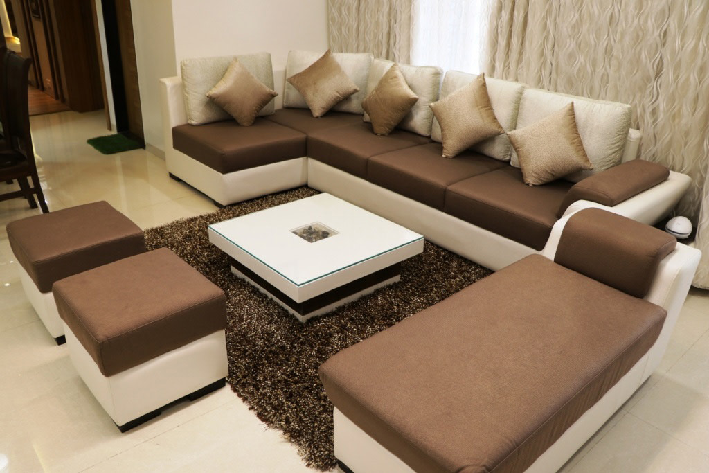 Brown Sectional Sofas With White Centre Table by Rajat Ajmera Living-room Minimalistic | Interior Design Photos & Ideas