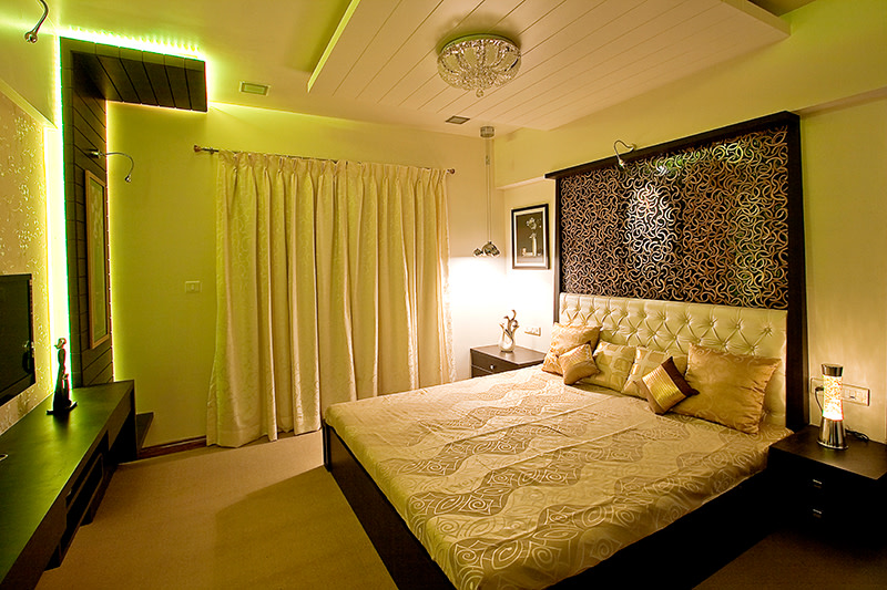 Low Rise Wooden Bed With Intricate Wooden Head cover Design by Rajat Ajmera Bedroom Contemporary | Interior Design Photos & Ideas