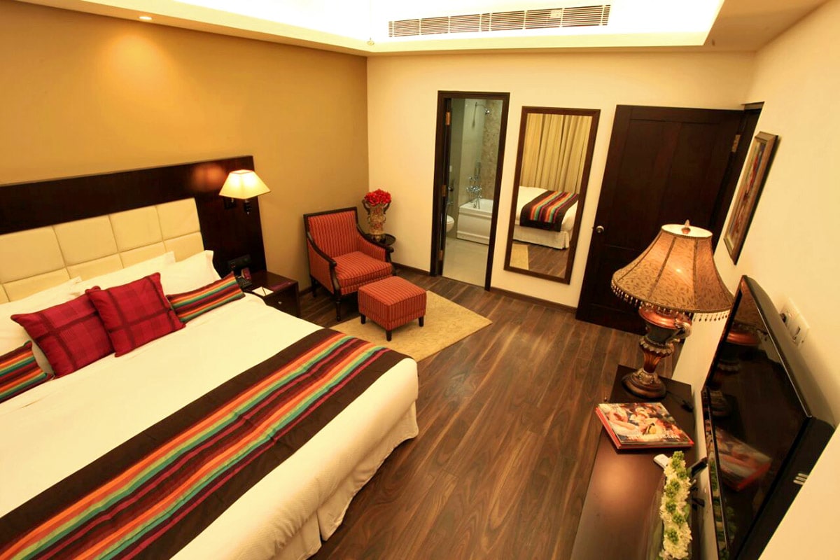 Wooden Flooring In Spacious Bedroom by Vanshika Singh Bedroom Contemporary | Interior Design Photos & Ideas