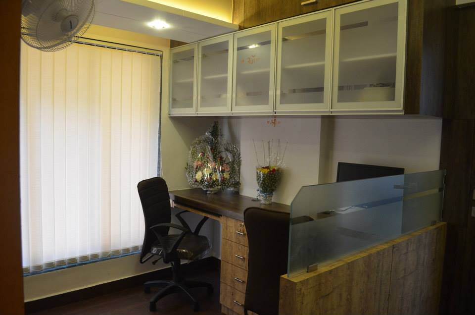 Office With Glass And Wooden Cabinets by Ar. Sachin Vasant Salvi Contemporary | Interior Design Photos & Ideas