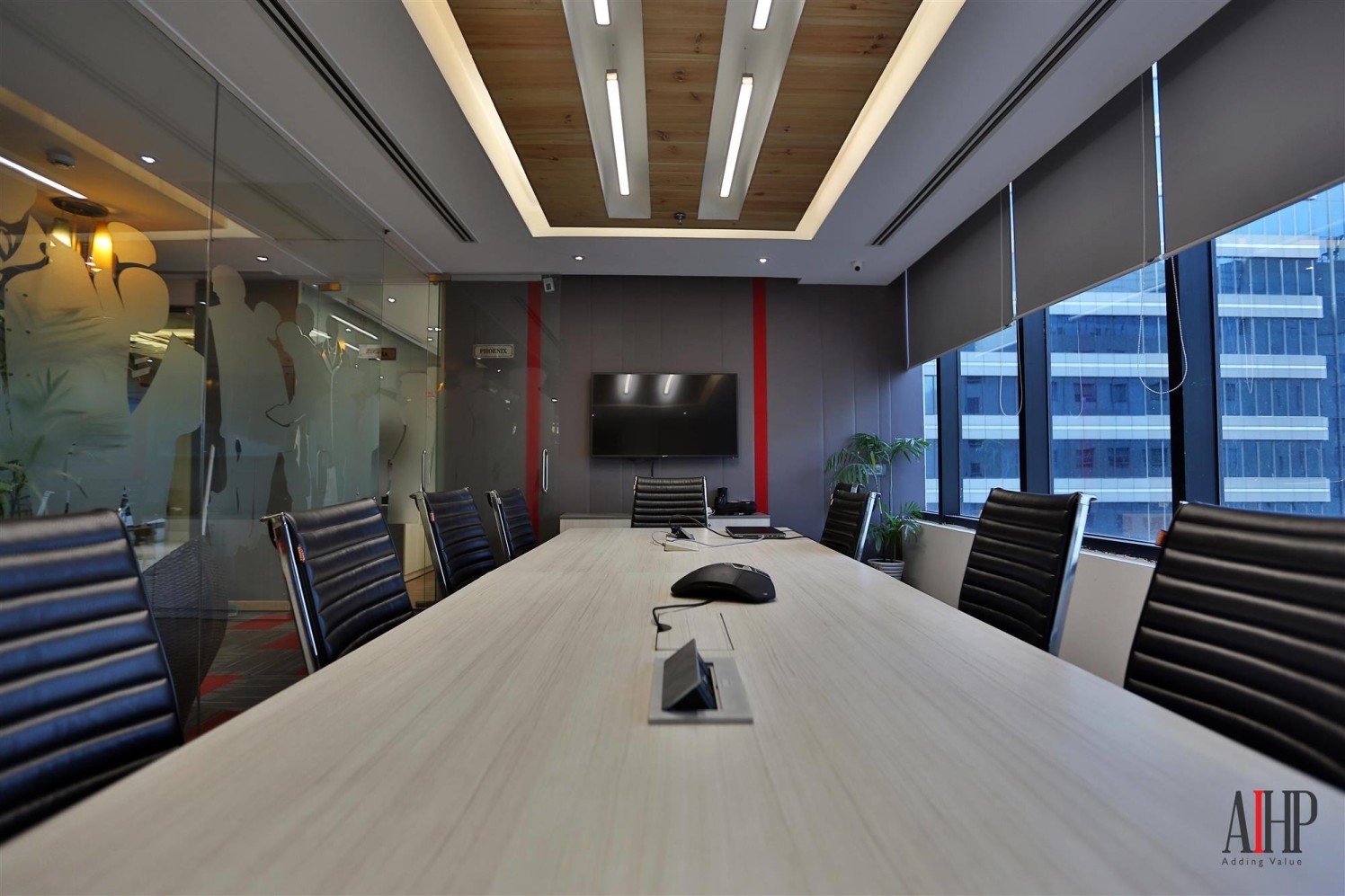 Conference Room with Pine Oak Wooden Table And Black Chairs by Arjun Sobti Modern | Interior Design Photos & Ideas
