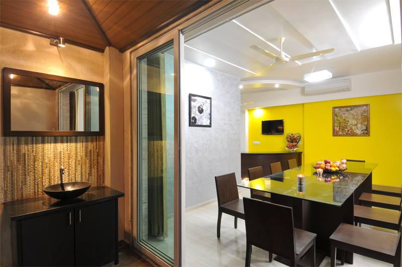 Deep contrast of yellow and bronze by L.M Architects & Designers Modern | Interior Design Photos & Ideas