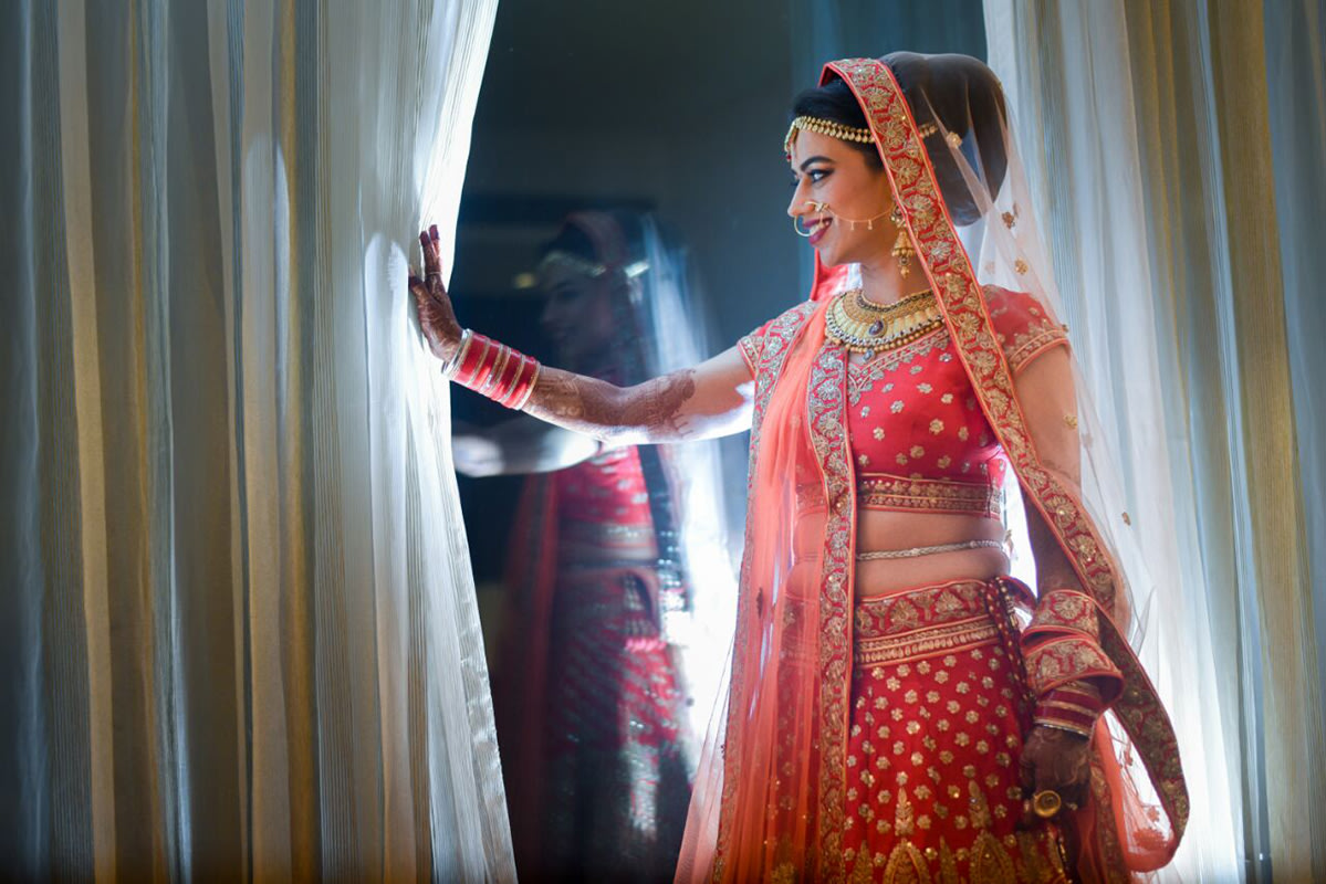 Picture perfect bride making sure everything is in place by Sagar Makwana Wedding-photography | Weddings Photos & Ideas