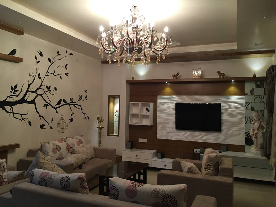 Cream sofa with pattern cushions and tv unit by Alaya D'Decor Living-room Eclectic | Interior Design Photos & Ideas