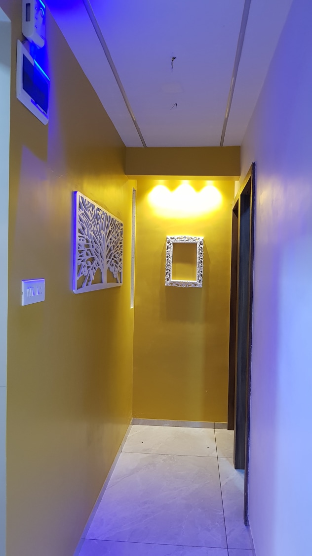 Yellow and blue shade Hallway by Alaya D'decor Indoor-spaces Modern | Interior Design Photos & Ideas