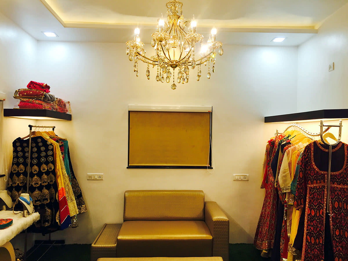Vintage Designed Chandelier In A Showroom by Anshuma Vaidya Bora Modern | Interior Design Photos & Ideas